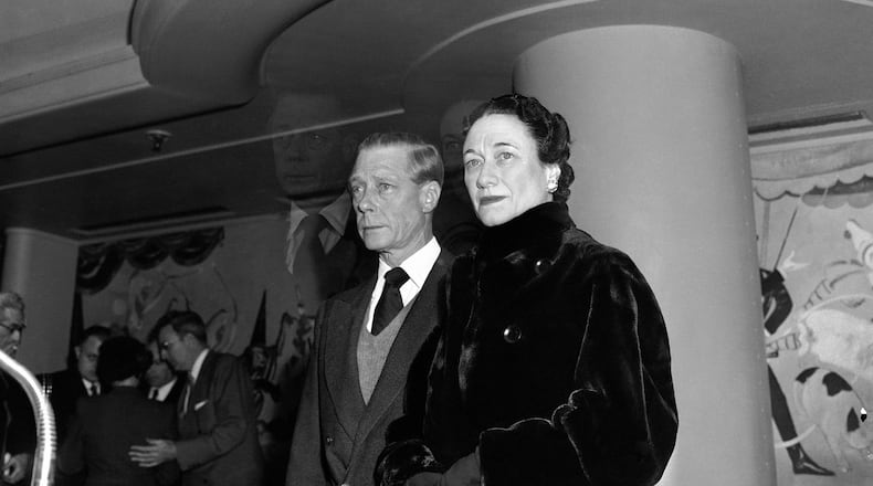FILE - The Duke of Windsor, Prince Edward stands with his wife the Duchess of Windsor, Wallis Simpson, before he sailed on the Queen Mary from New York on Feb. 7, 1952, en route to England for the funeral of his brother, the late King George VI.  (AP Photo, File)