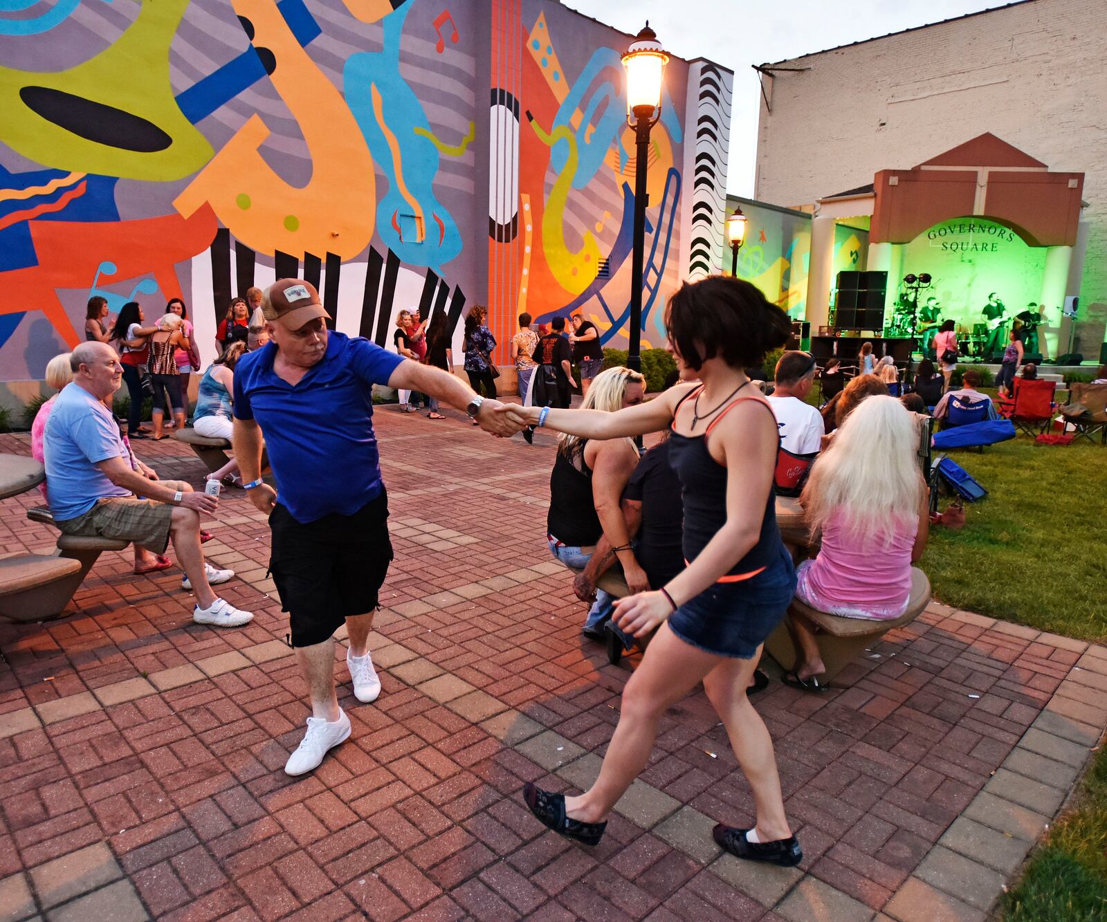 David Skaggs and Victoria Morris dance to the music of the Nick Netherton Band during last year’s first Broad Street Bash in Middletown. NICK GRAHAM/STAFF