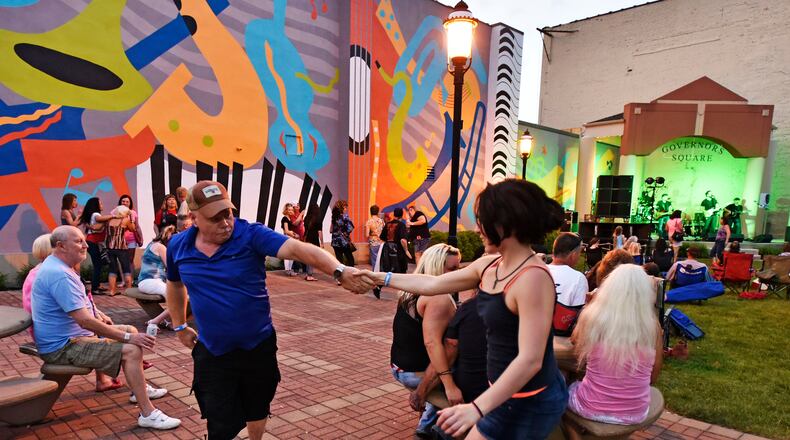 David Skaggs and Victoria Morris dance to the music of the Nick Netherton Band during last year’s first Broad Street Bash in Middletown. NICK GRAHAM/STAFF