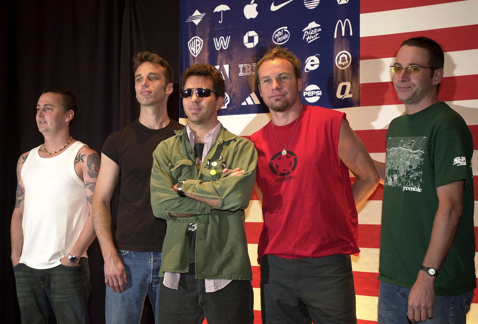 FILE - Pearl Jam members, from left, Mike McCready, Matt Cameron, Eddie Vedder, Jeff Ament and Stone Gossard appear at a news conference in Mexico City, on July 17, 2003. (AP Photo/Jaime Puebla, File)