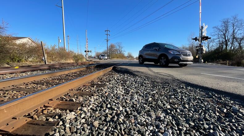 The city of Fairfield was awarded federal funds related to the planning and development of a possible bridge to go over the Symmes Road railroad crossing just northwest of Industrial Drive. The project would not be unlike the South Hamilton Crossing project in Hamilton. Pictured is the railroad crossing on Monday, Nov. 21, 2022. MICHAEL D. PITMAN/FILE (2022)