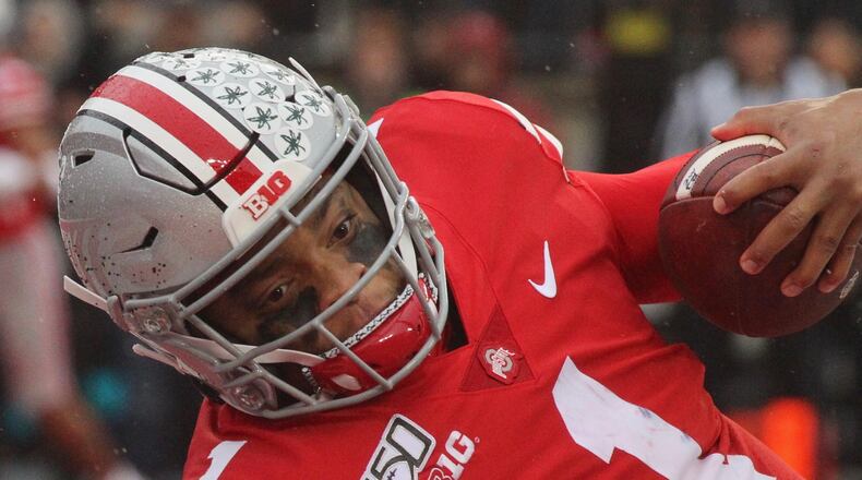 Ohio State’s Justin Fields runs for a touchdown against Wisconsin on Saturday, Oct. 26, 2019, at Ohio Stadium in Columbus. David Jablonski/Staff