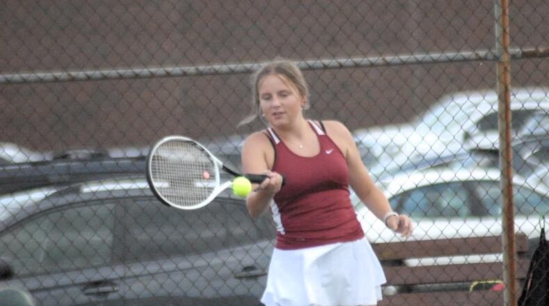 Ross senior Laney Johnson sends a return back against Monroe on Tuesday. Chris Vogt/CONTIBUTED