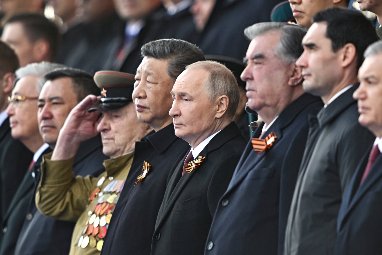 From second right: Turkmenistan President Serdar Berdimuhamedow, Tajikistan's President Emomali Rakhmon, Russian President Vladimir Putin and Chinese President Xi Jinpin watch the Victory Day military parade in Moscow, Russia, Friday, May 9, 2025, during celebrations of the 80th anniversary of the Soviet Union's victory over Nazi Germany during the World War II. (Sergei Bobylev/Photo host agency RIA Novosti via AP)