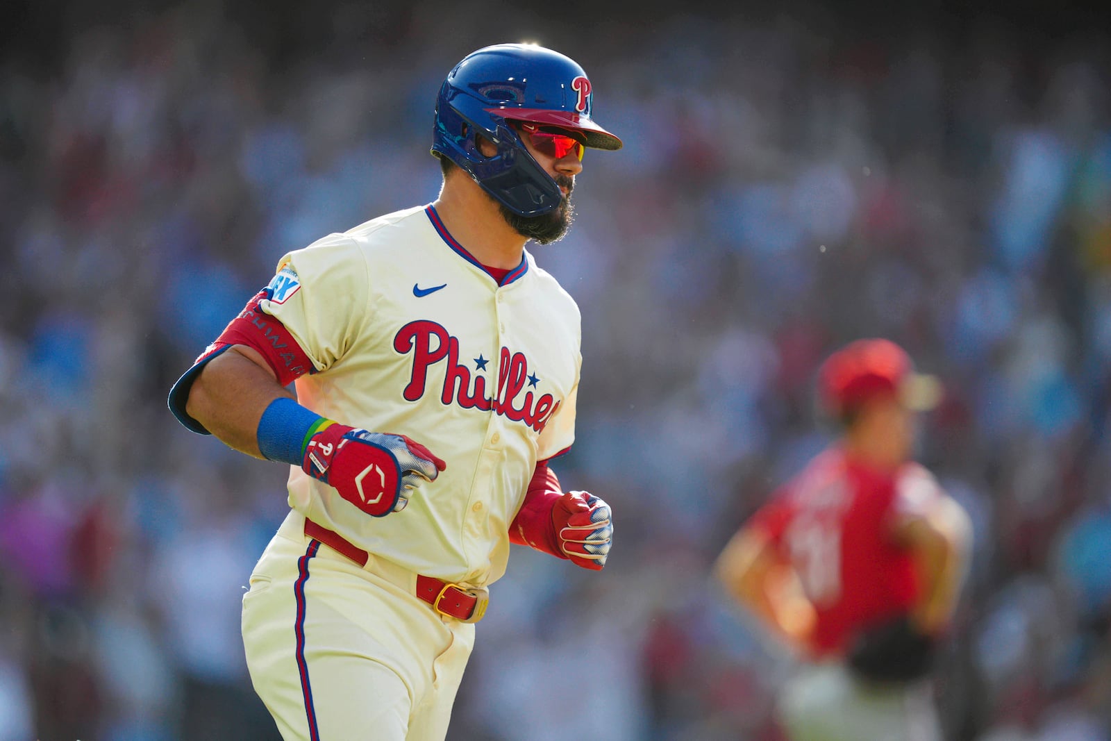 Philadelphia Phillies' Kyle Schwarber runs the bases after hitting a two-run home run off Cincinnati Reds pitcher Brent Suter during the eighth inning of a baseball game, Saturday, July 5, 2025, in Philadelphia. (AP Photo/Derik Hamilton)