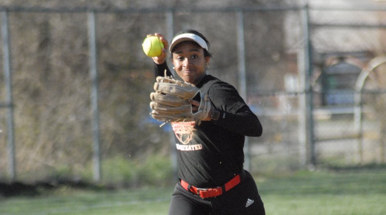 Lakota West senior shortstop Leilah Ferrari looks to make a play to first base during a preseason practice. Chris Vogt/CONTRIBUTED