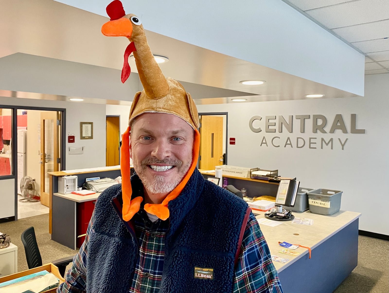 For more than a decade Middletown’s Central Elementary has made packing Thanksgiving meals and other items for needy local families a total school event.
The goal, said Central Elementary Principal Stephen Sippel - who Thursday played the energetic cheerleader for the event - is to give each student a literal hand in passing on charity to some of the school’s lower income families. (Photo By Michael D. Clark/Journal-News)