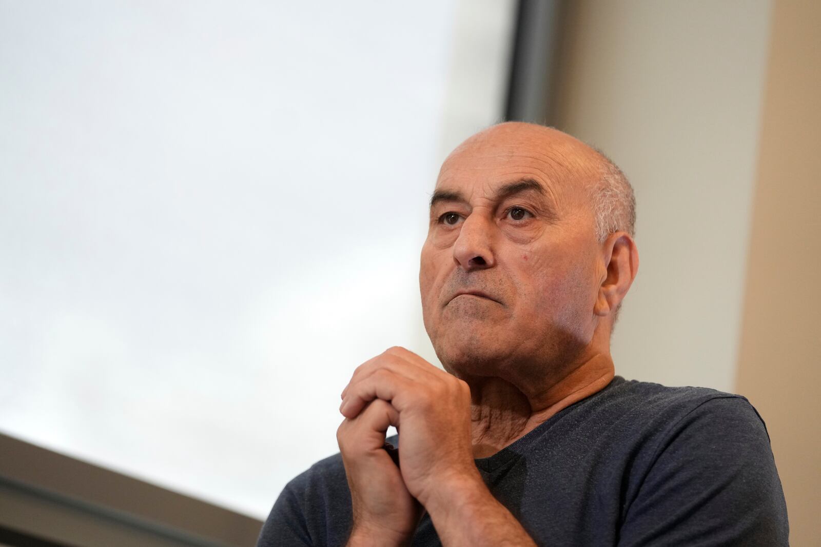 Yunice Abbas, one of the men accused in the 2016 armed robbery of Kim Kardashian, reacts during an interview with the Associated Press, Tuesday, April 22, 2025 in Paris. (AP Photo/Thibault Camus)