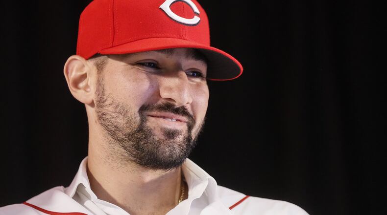 Cincinnati Reds’ Nick Castellanos wears his cap during a news conference, Tuesday, Jan. 28, 2020, in Cincinnati. Castellanos signed a $64 million, four-year deal with the baseball club. (AP Photo/John Minchillo)