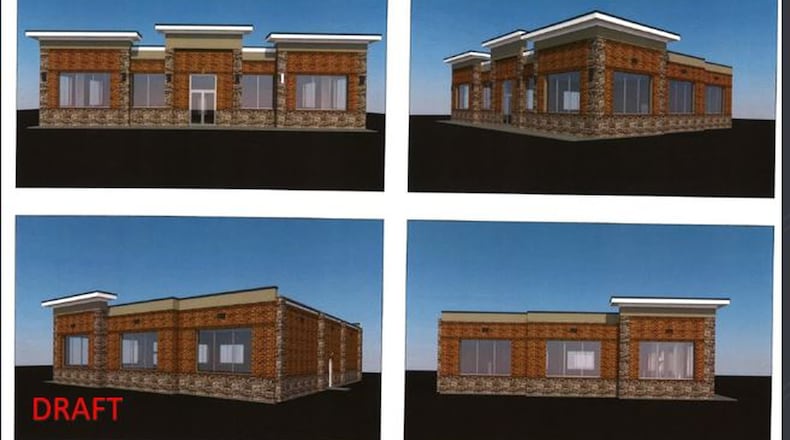 This is a preliminary illustration of what a proposed 4,000 square-foot gas station/convenience store might look like on a vacant parcel on South Main Street adjacent to where Monroe is renovating a former IGA grocery store into its new police headquarters. Monroe City Council will consider final approval of an ordinance to amend the 2001 Planned Unit Development agreement at its Oct. 8 meeting. CONTRIBUTED/CITY OF MONROE