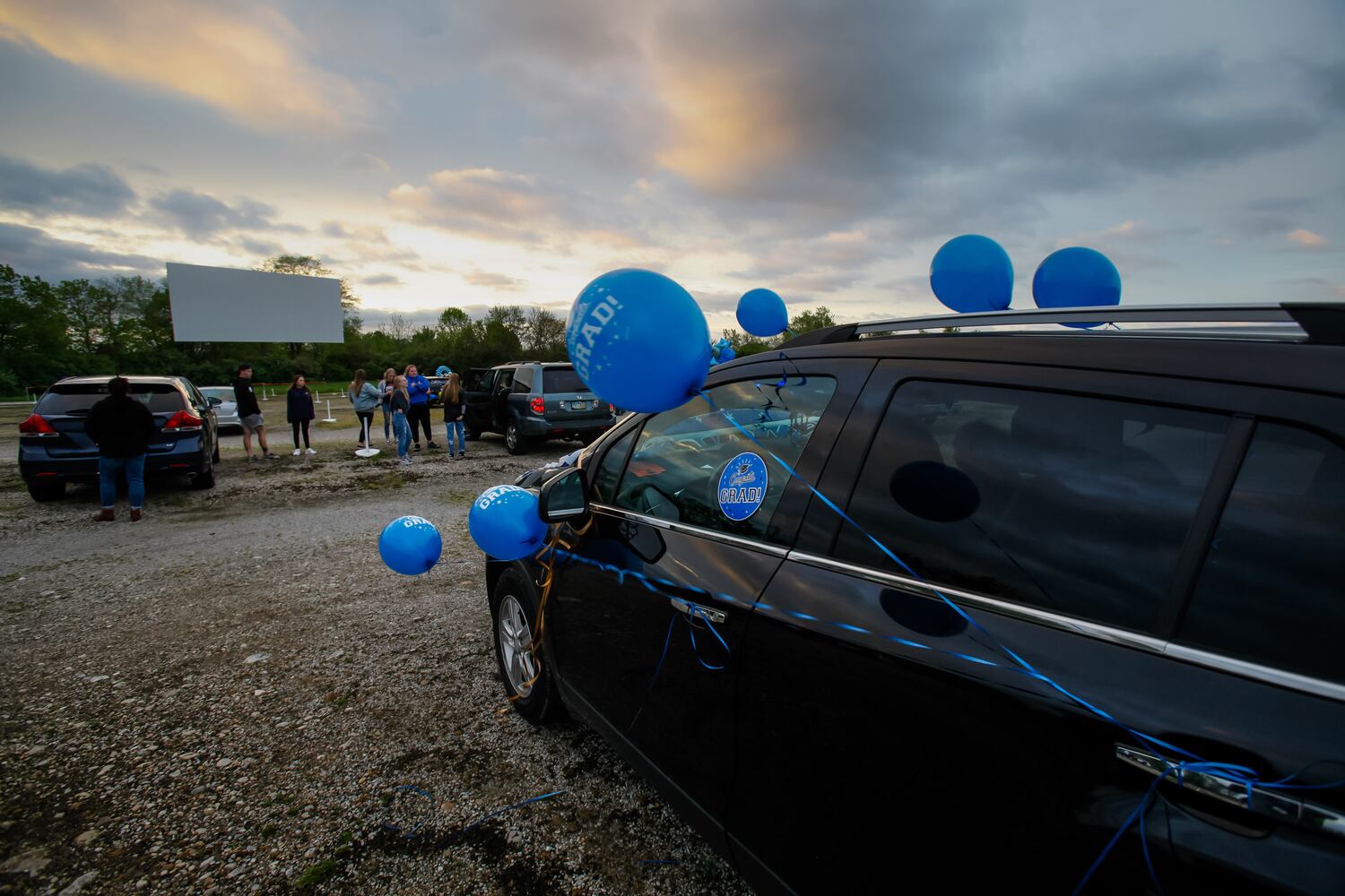 Hamilton High School seniors celebrate graduation at Holiday Auto Theatre drive-in