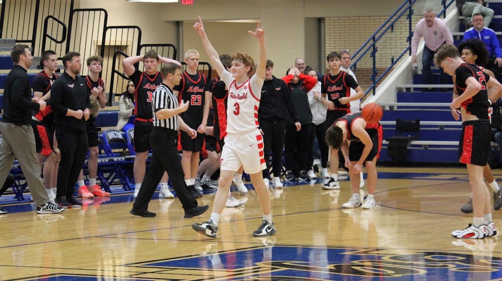 Fairfield’s Peyton Jones celebrates after making a game-winning shot to lead the Indians over Milford on Wednesday. MARK BRAAM / CONTRIBUTED