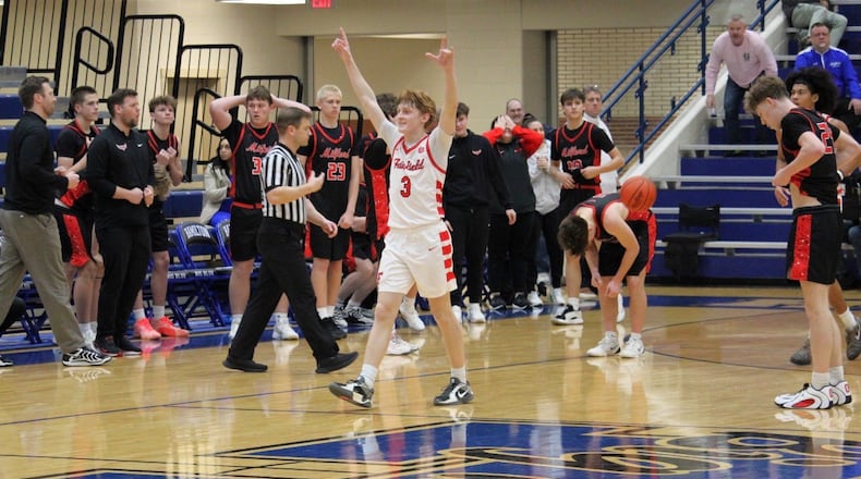 Fairfield’s Peyton Jones celebrates after making a game-winning shot to lead the Indians over Milford on Wednesday. MARK BRAAM / CONTRIBUTED