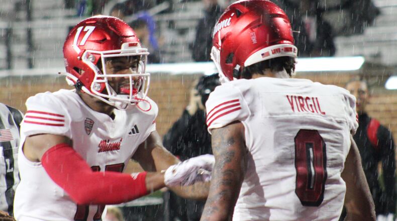 Reggie Virgil celebrates a touchdown against Ball State on Nov. 5. Kasey Turman/CONTRIBUTED