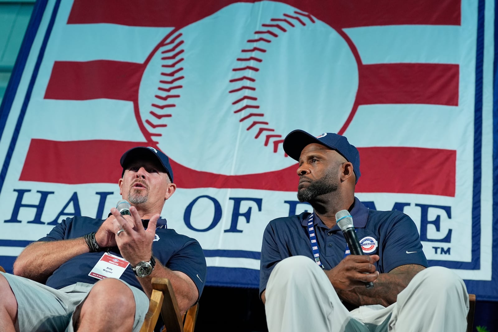 Baseball Hall of Fame inductees Billy Wagner, left, and CC Sabathia speak to reporters during a news conference in Cooperstown, N.Y., Saturday, July 26, 2025. (AP Photo/Seth Wenig)