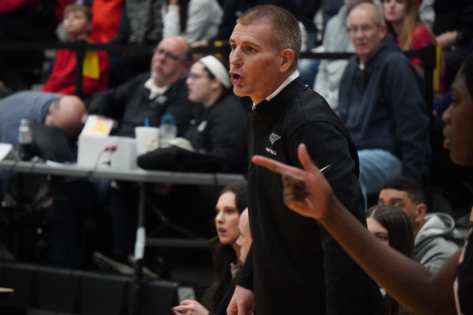 Lakota East coach Dan Wallace calls out a play during his team’s game against Lakota West on Friday night. CHRIS VOGT / CONTRIBUTED