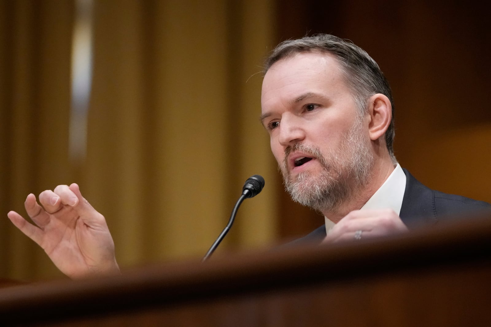 U.S. Trade Representative Jamieson Greer testifies before the Senate Finance Committee on Capitol Hill in Washington, Tuesday, April 8, 2025. (AP Photo/Mark Schiefelbein)