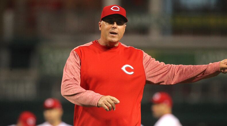 Reds manager Bryan Price argues a call during a game against the Cardinals on April 20, 2017, at Great American Ball Park in Cincinnati. David Jablonski/Staff