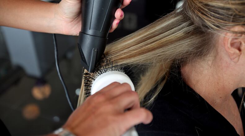 Many people entering the cosmetology field have the misconception that there is only one career path — behind the chair — when there as “so many different opportunities” besides that, said Wallis Doyle, admissions leader at Paul Mitchell The School Cincinnati. STAFF FILE PHOTO