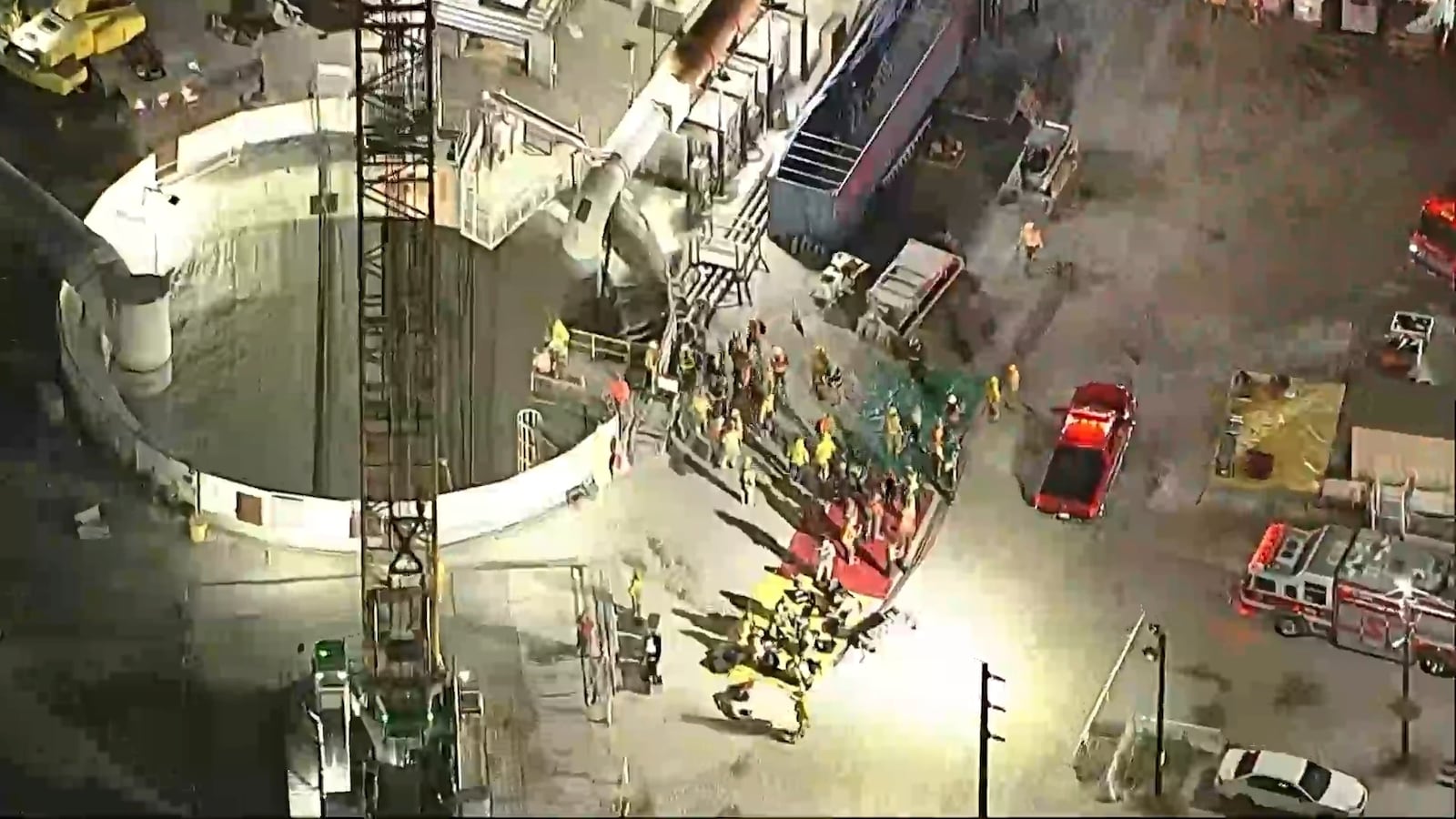 This image taken from footage provided by KABC/ABC7 Los Angeles shows first responders working the scene after a tunnel collapsed on Wednesday, July 9, 2025, in Los Angeles. (KABC/ABC7 Los Angeles via AP)