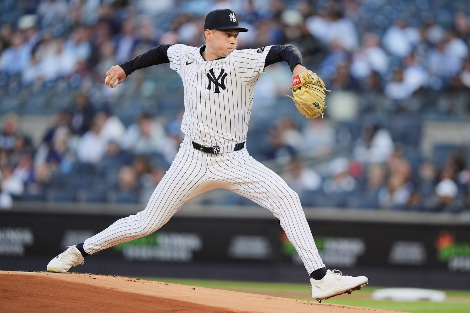 New York Yankees pitcher Will Warren pitches during the first inning of a baseball game against the Texas Rangers Tuesday, May 20, 2025, in New York. (AP Photo/Frank Franklin II)