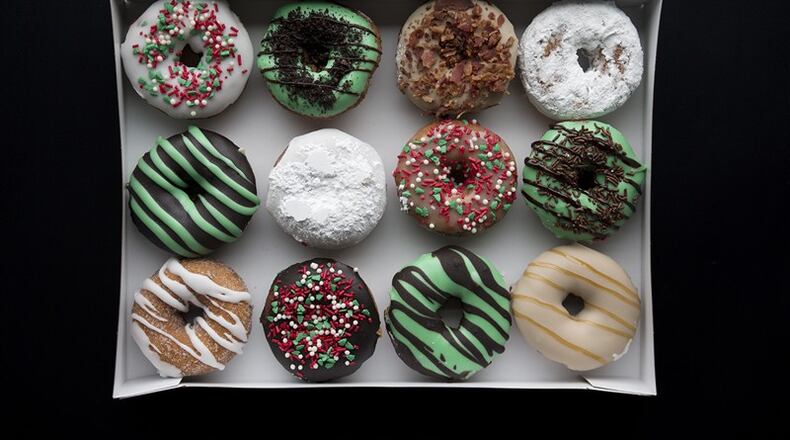Duck Donuts is offering holiday season-themed doughnuts through Dec. 31. CONTRIBUTED