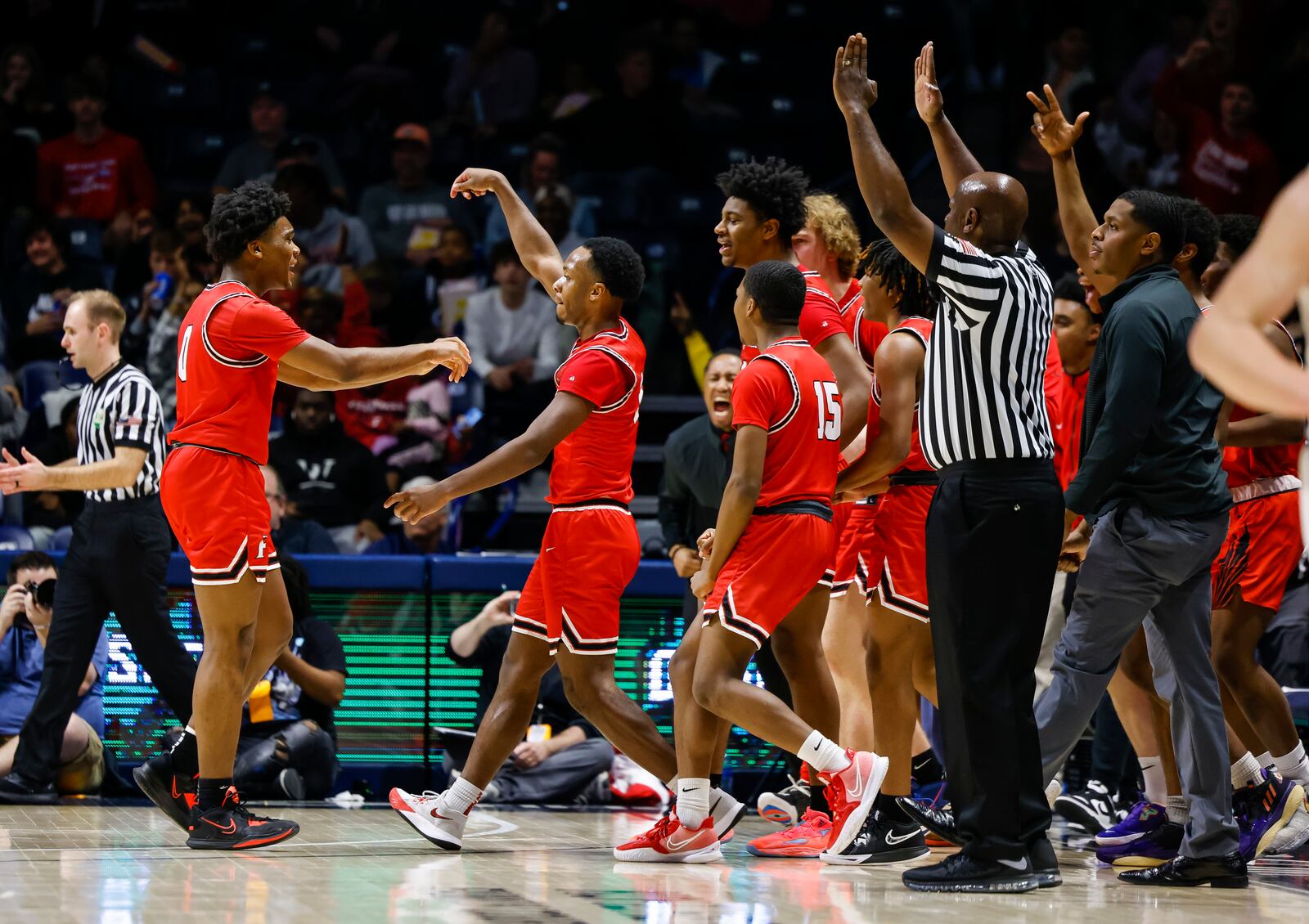 Fairfield's DeShawne Crim celebrates a three-point basket during their Division I regional final basketball game Saturday, March 11, 2023 at Xavier University's Cintas Center. Centerville won 64-53. Crim became Fairfield's all-time leading scorer during the game with a total of 1354 career points. NICK GRAHAM/STAFF