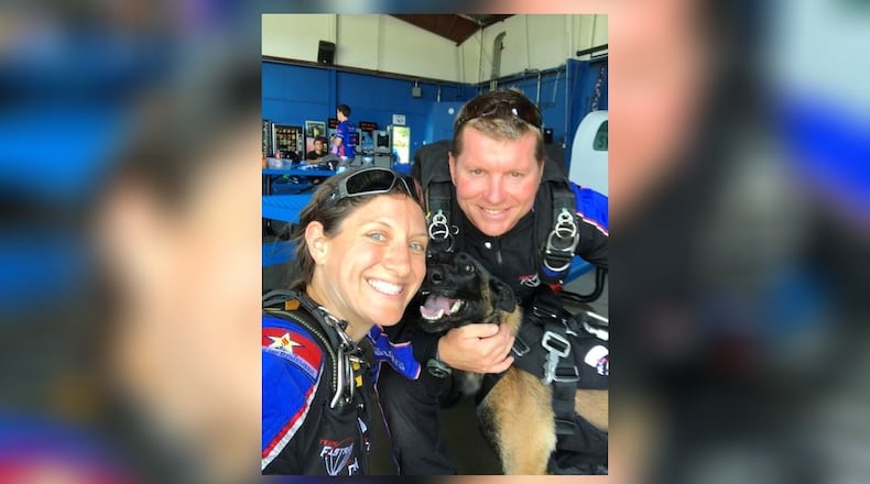 Ron Condrey, a U.S. Navy veteran, with his wife, Nicole, and his service dog, Via. SUBMITTED PHOTO