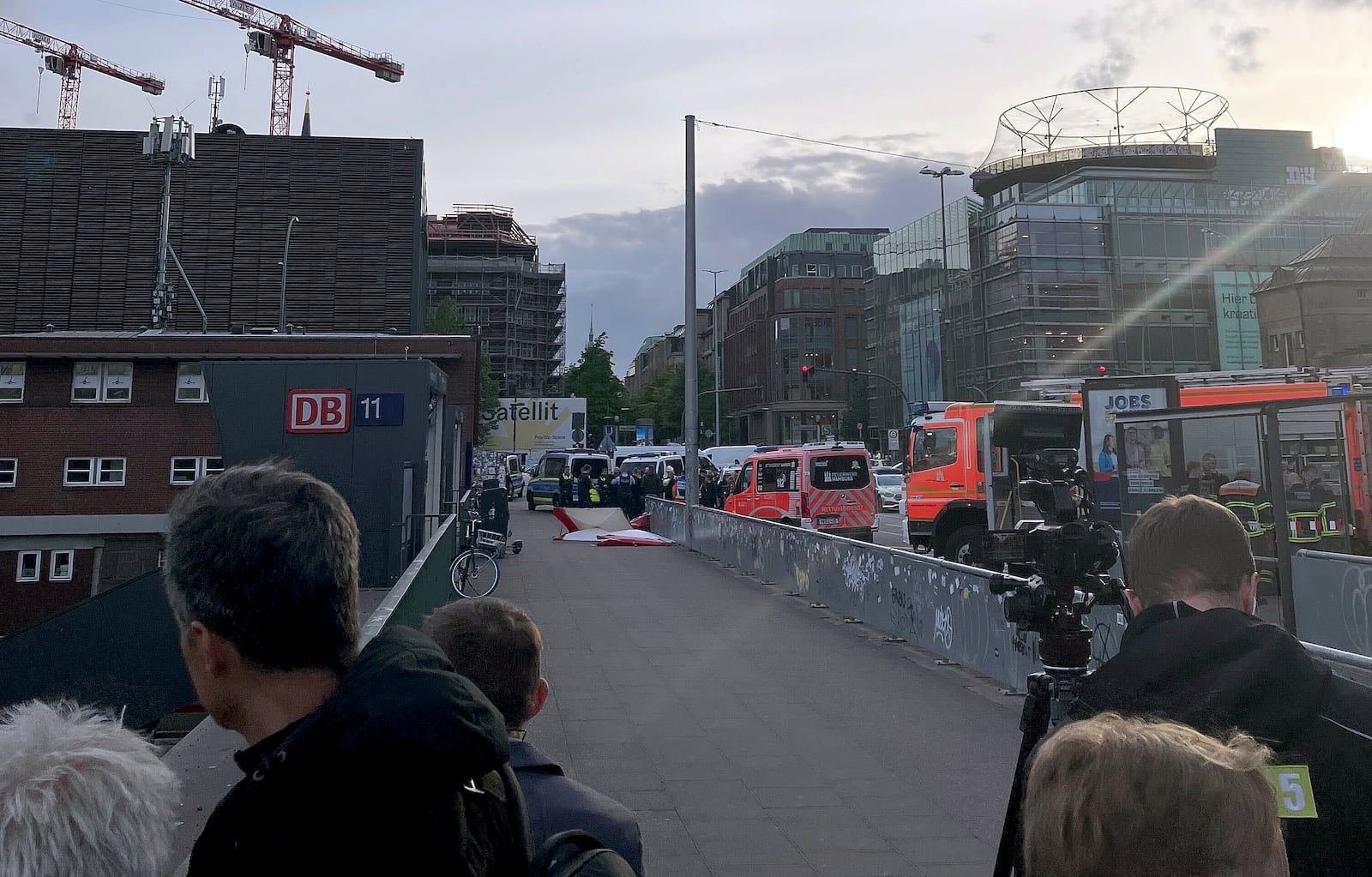 Emergency services at the scene of a stabbing at Hamburg Central Station in Hamburg, Germany, Friday, May 23, 2025. (Lukas Mueller/dpa via AP)