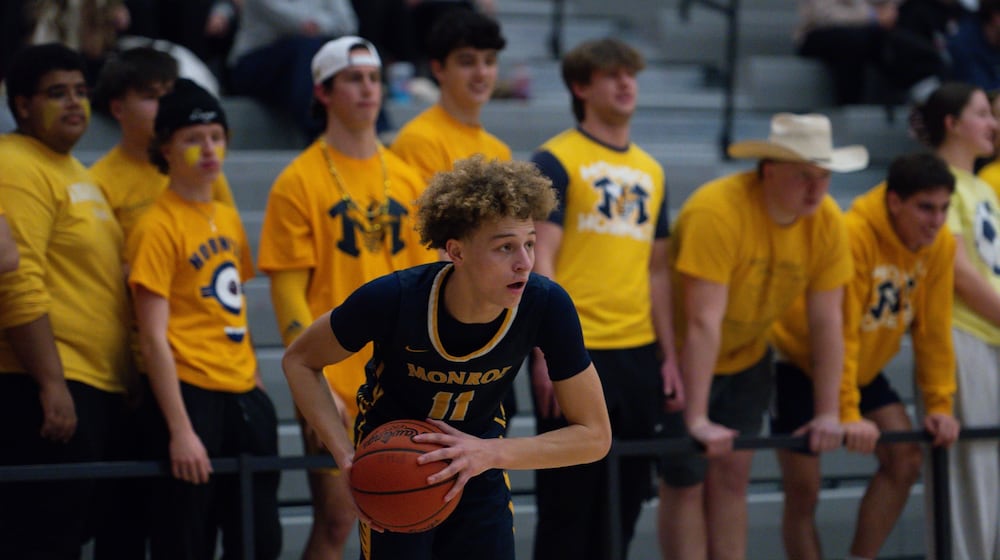 Monroe's Bryant Lee looks for a passing lane during his Division III tournament game against Northwest on Thursday, Feb. 26, 2026 at Princeton High School. AJ FULLAM / CONTRIBUTED
