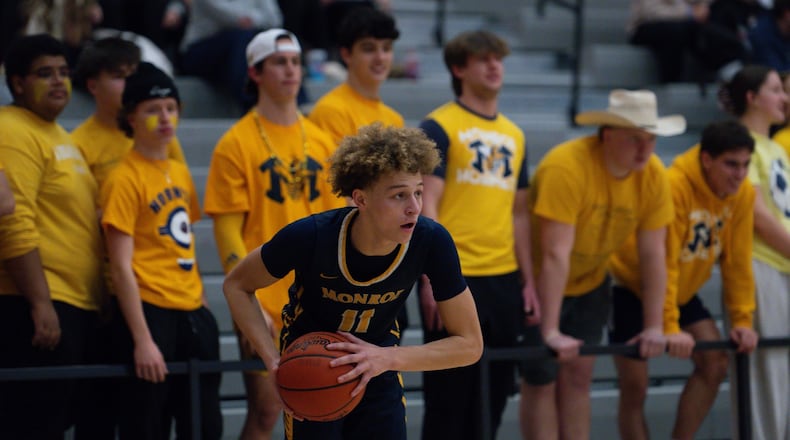 Monroe's Bryant Lee looks for a passing lane during his Division III tournament game against Northwest on Thursday, Feb. 26, 2026 at Princeton High School. AJ FULLAM / CONTRIBUTED