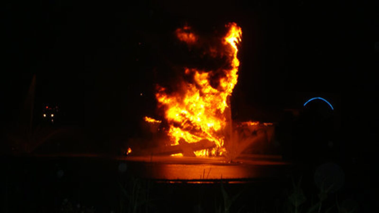 This photo was taken by Tiffani West-May, of Fairborn, who was on her way home from Cincinnati on Monday, June 14, 2010. The photo was shot at 11:20 p.m.; the camera shows the incorrect time by one hour. The large Jesus statue, iconic to I-75, was destroyed following an apparent lightning strike during a thunderstorm late Monday night.
