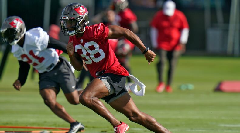 Tampa Bay Buccaneers corner back Nate Brooks (38) runs a drill during an NFL football minicamp Tuesday, June 8, 2021, in Tampa, Fla. (AP Photo/Chris O'Meara)