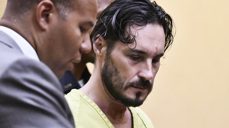 James Geran, charged with double murder and charges from the Trenton standoff was arraigned in Butler County Common Pleas Court represented by attorney Lawrence Hawkins III on Monday, July 9 in Hamilton. NICK GRAHAM/STAFF