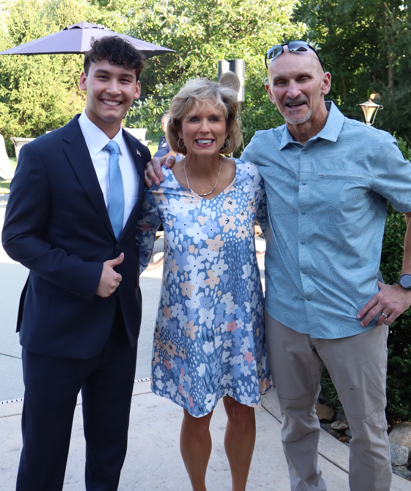 Butler County Auditor Nancy Nix, who hosted a fundraiser for Benjamin Nguyen, was among the local GOP leaders to back the 18-year-old's campaign for the Lakota school board. Pictured is Nguyen, Nix and her husband at their fundraiser. (Provided)