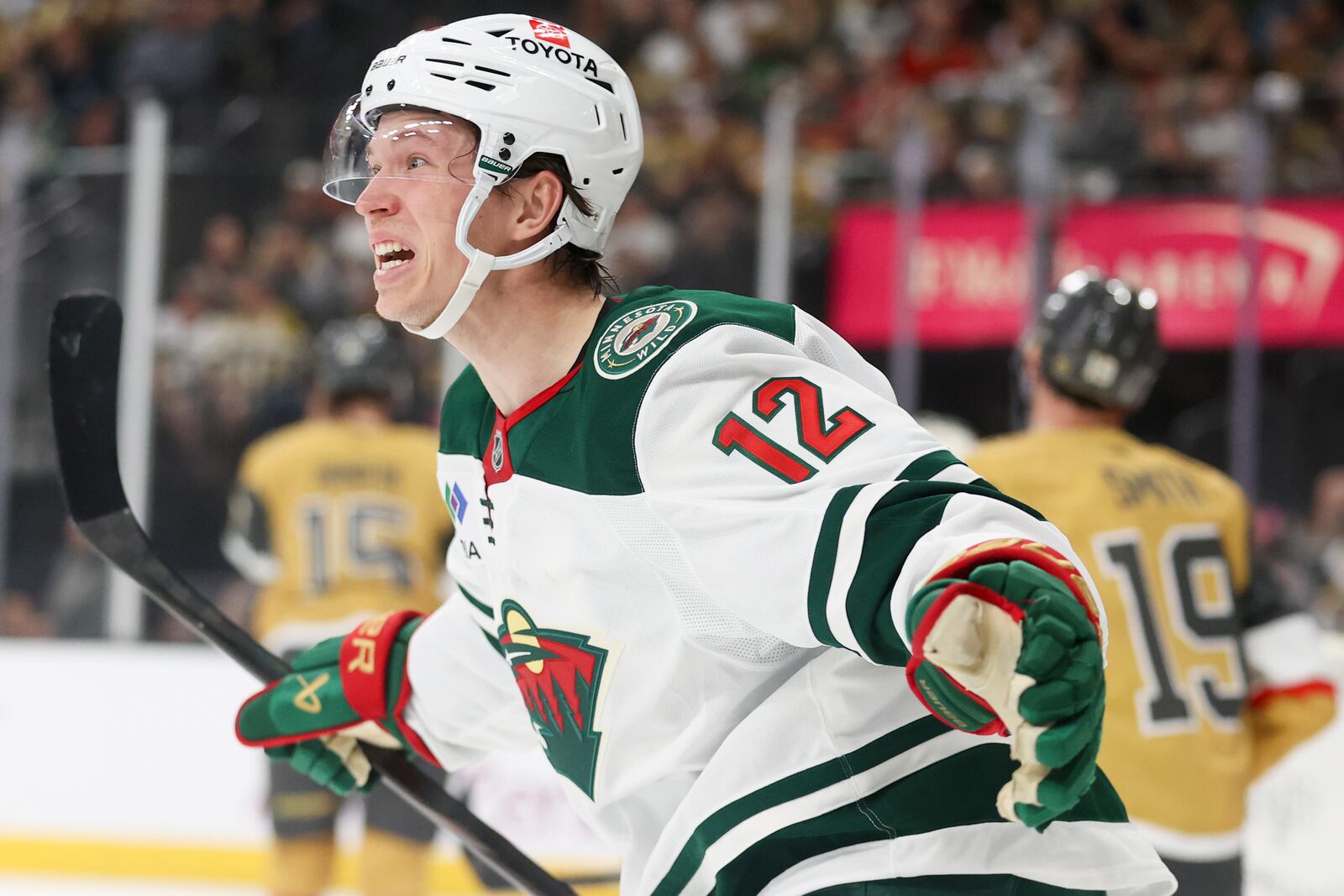 Minnesota Wild left wing Matt Boldy (12) celebrates after scoring a goal during the first period in Game 1 of an NHL hockey Stanley Cup first-round playoff series against the Vegas Golden Knights Sunday, April 20, 2025, in Las Vegas. (AP Photo/Ian Maule)