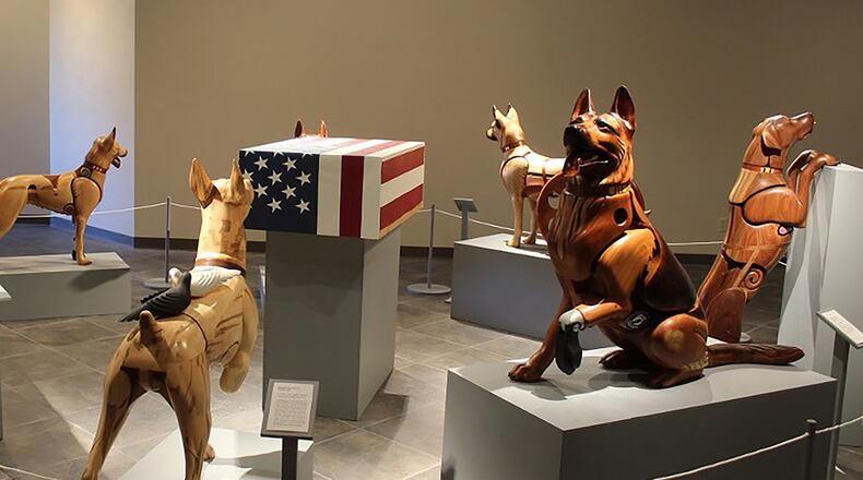 A temporary exhibit featuring wounded warrior dog wooden sculptures by artist James Mellick will be on display at the National Museum of the U.S. Air Force Nov. 8 through Jan. 31. (Contributed photos)