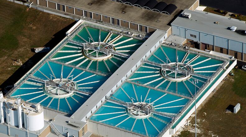 8-11-14  --  Aerial view of the Lime treatment tanks at the City of Dayton Miami Water Treatment Plant.  Dayton draws water form The Great Miami River Buried Aquifer, but treats the water to a stricter surface water standard.   TY GREENLEES / STAFF