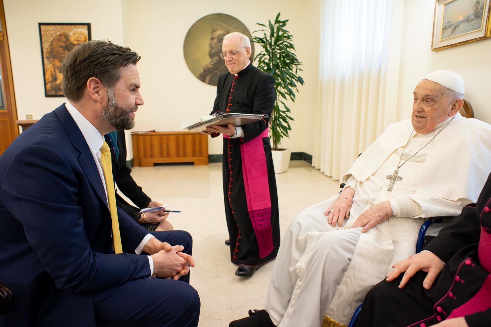 Pope Francis receives U.S. Vice President JD Vance, left, before bestowing the Urbi et Orbi (Latin for to the city and to the world) blessing at the end of the Easter mass presided over by Cardinal Angelo Comastri in St. Peter's Square at the Vatican Sunday, April 20, 2025. At center the head of the papal houshold Bishop Leonardo Sapienza. (Vatican Media via AP, HO)