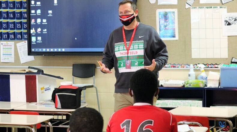 Billy Smith, superintendent of Fairfield Schools, shown here filling in as a substitute teacher due to coronavirus-caused staff shortages, says the district will delay the start of in-person classes next week. Fairfield officials and other school officials in some local districts say switching to all remote learning for the first week of winter classes will lessen the chances of a rise in coronavirus cases. (File Photo\Journal-News)