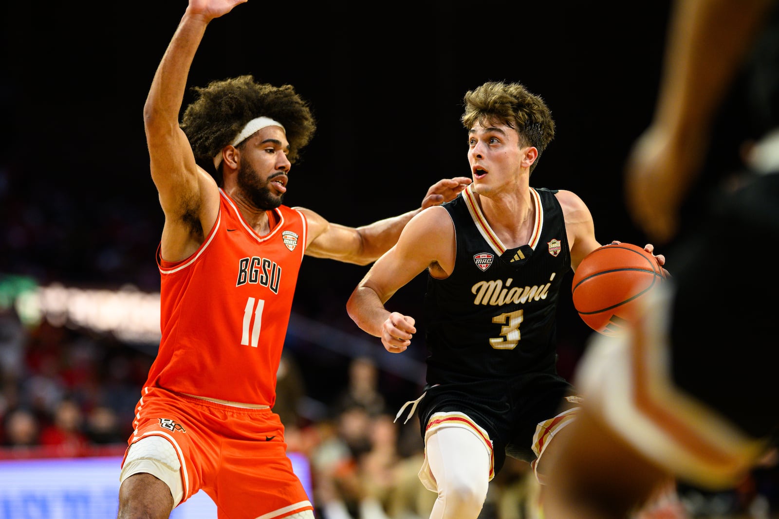 Miami University's Luke Skaljac dribbles while being guarded by Bowling Green's Javon Ruffin during their game on Friday, Feb. 20, 2026 at Millett Hall. The RedHawks won 91-77. JEREMY MILLER / CONTRIBUTED PHOTO