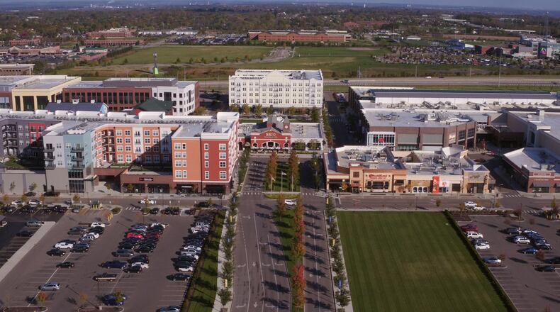 Liberty Center has sued an Illinois-based entertainment company for $850,000 in back rent and late fees because it never opened the In the Game center in the mega mall development.