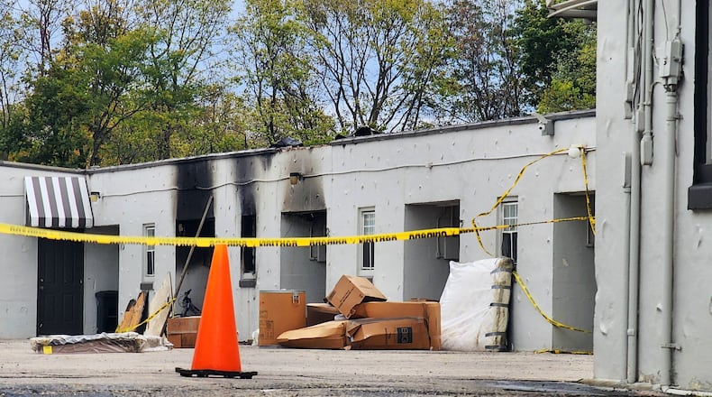 A man was injured in a fire Friday afternoon at the Dixie Motel on Cincinnati-Dayton Road. NICK GRAHAM/STAFF