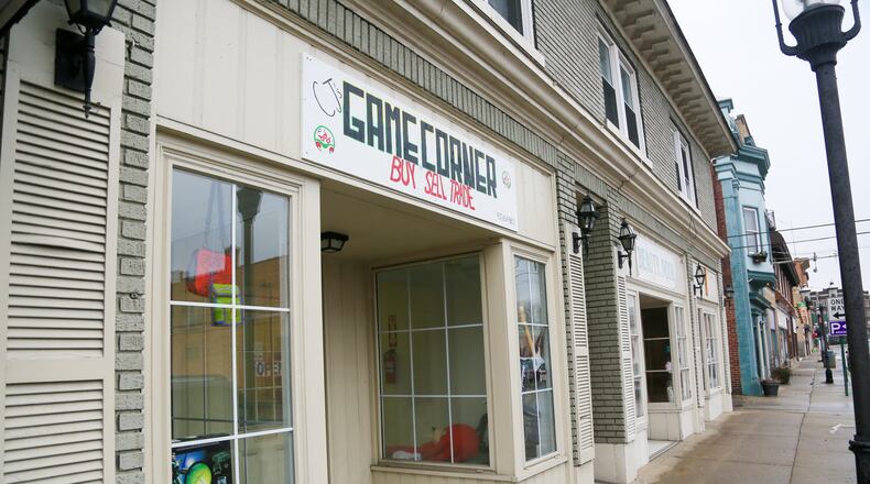 CJ’s Game Corner, 1326 Central Ave. in Middletown, offers a wide variety of used video gaming consoles , video games and accessories. GREG LYNCH / STAFF