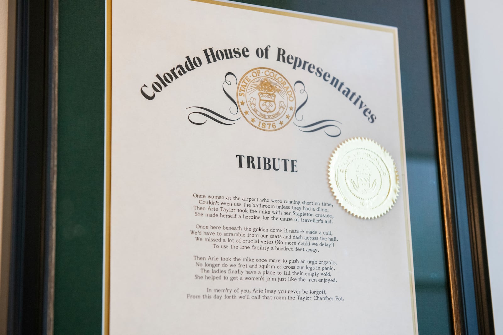 A plaque memorializing when the restroom was created in 1987 in the women's restroom in the House chamber's hallway at the state Capitol on Monday, July 21, 2025, in Denver. (AP Photo/Rachel Woolf)