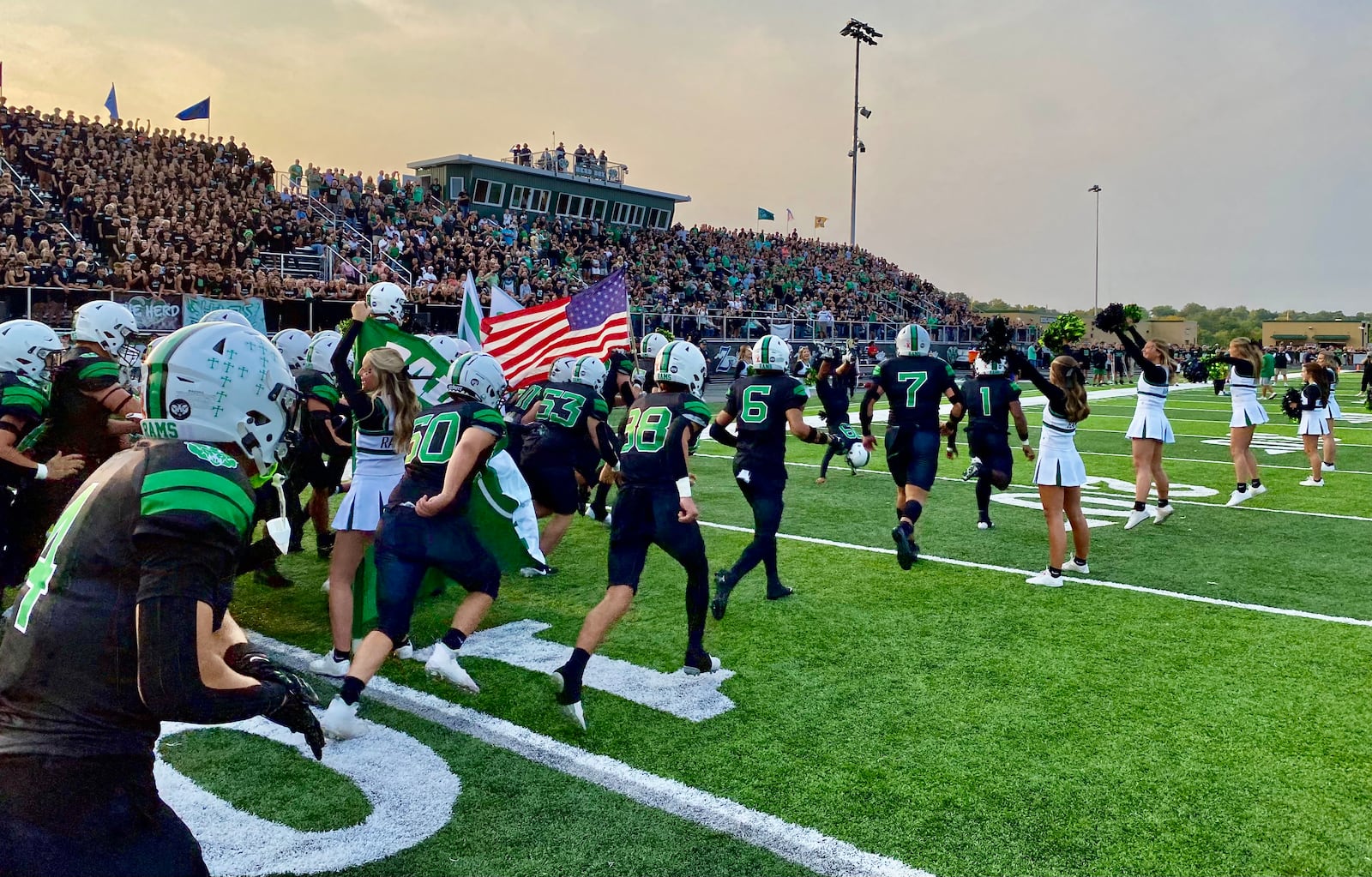Badin High School’s first home football game Friday evening was 60 years in the making. And a standing room only crowd packed into the school’s first football game in its recently opened stadium and thousands turned out to join in to be part of Butler County prep sports history. (Photo By Michael D. Clark/Journal-News)