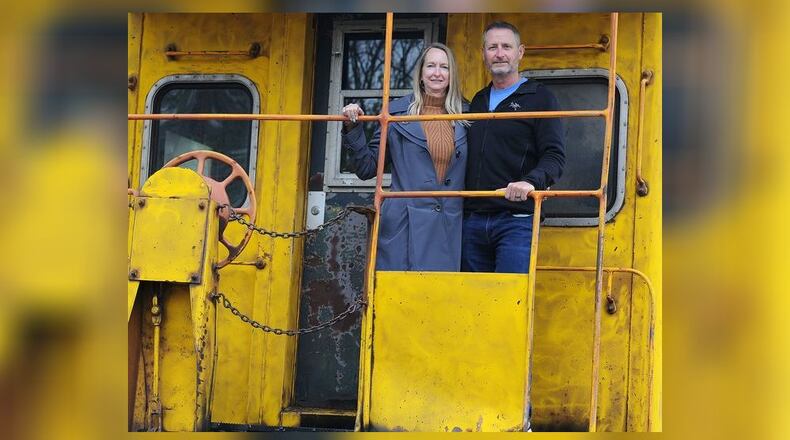 Entrepreneur couple Ray and Karen DeVite are turning old train cars into Airbnb's on the east side of Xenia. MARSHALL GORBY\STAFF