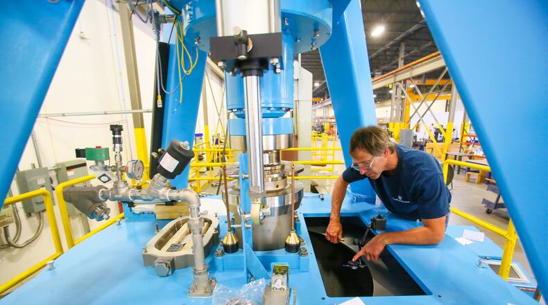 Terry Bolser looks over a TITAN Batch Centrifuge at Western States in Fairfield, Thursday, July 20, 2017. Western States, which celebrated its 100th anniversary in 2017, is an international provider of technologically advanced centrifuges. GREG LYNCH / STAFF