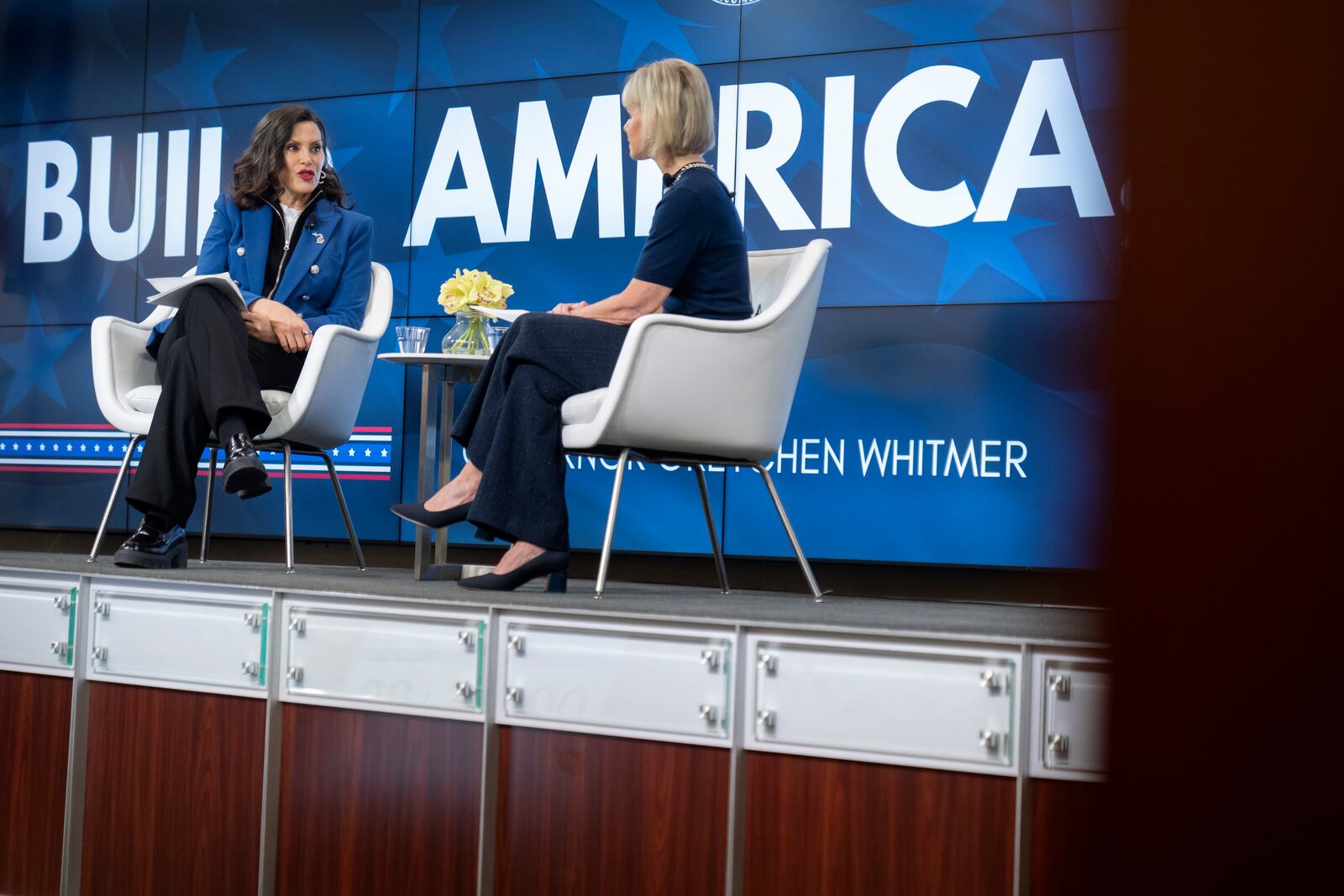 Michigan Gov. Gretchen Whitmer speaks with former television journalist Gretchen Carlson at an event on Wednesday, April 9, 2025, in Washington. (AP Photo/Mark Schiefelbein)
