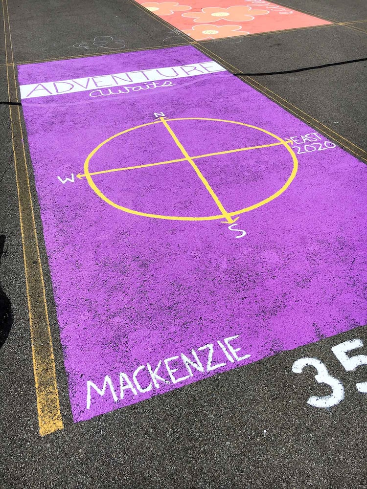 PHOTOS Lakota East seniors paint parking spots